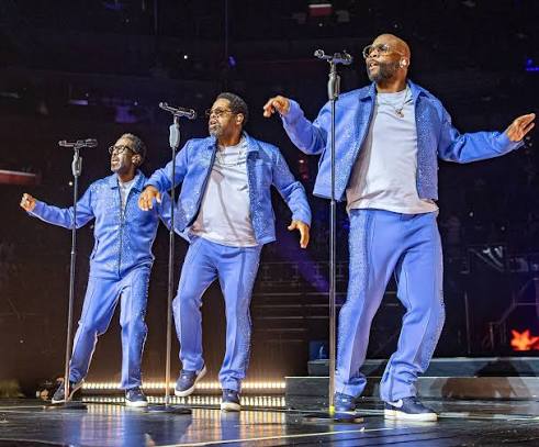 Boyz II Men performing live on stage